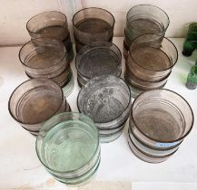 A large quantity of heavy green and smoky Venetian glass dessert bowls by Pauly & C