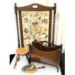 A needlework firescreen; a magazine rack; a footstool; a brass shovel