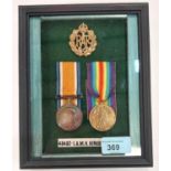 WWI pair of medals to 48482 IAM H. KIRKBY, RAF, in display case with cap badge