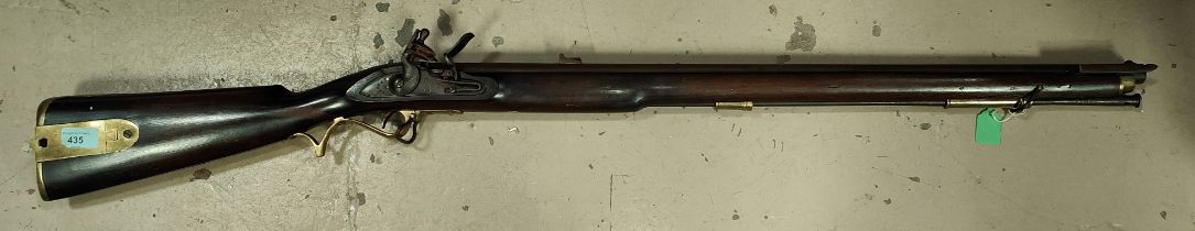 A Baker style flintlock rifle, lock stamped with Crown and G.R., length 119cm.