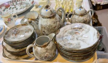 A Japanese satsuma style part tea service in eggshell porcelain, 27 pieces approx.