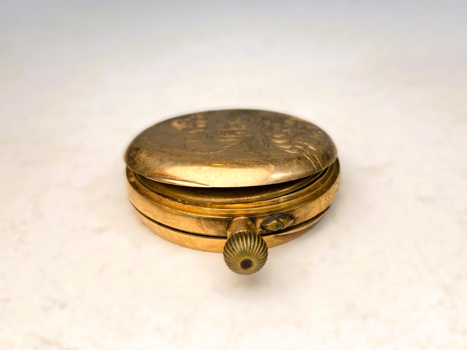 A chased yellow metal open faced keyless fob watch, the outer back case stamped 14K (a.f); a similar - Image 5 of 5