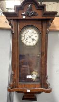 A 19th century Vienna wall clock in walnut case, spring driven with strike