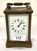 A late 19th/early 20th century brass carriage clock with timepiece movement by Dent, Pall Mall,