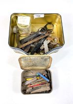 A collection of vintage watch tools, case back openers etc