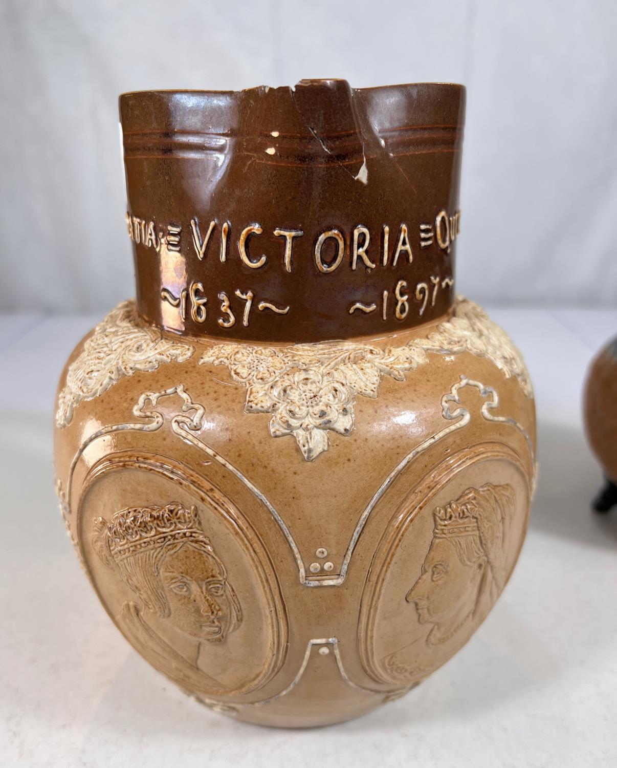 A Doulton brown stoneware jug commemorating Queen Victoria's Diamond Jubilee 1897, ht. 20cm (spout - Image 2 of 9