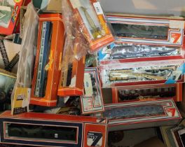 A collection of Hornby and Lima boxed carriages, trucks etc