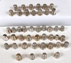 A selection of hallmarked silver thimbles, various dates and assay offices, 7oz.