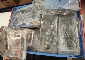 A large collection of Die-cast scale model helicopters in blister packs