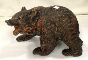 A Black Forest carved bear, length 28cm