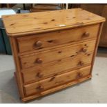 A modern pine 4 height chest of drawers and bedside cabinet