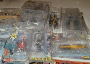 A large collection of diecast scale models of helicopters in packaging and blister packs, Ameri.