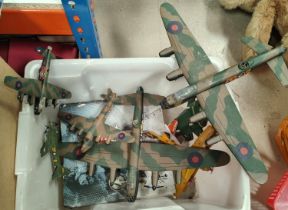 A collection of die-cast models of WWII period aeroplanes, other models
