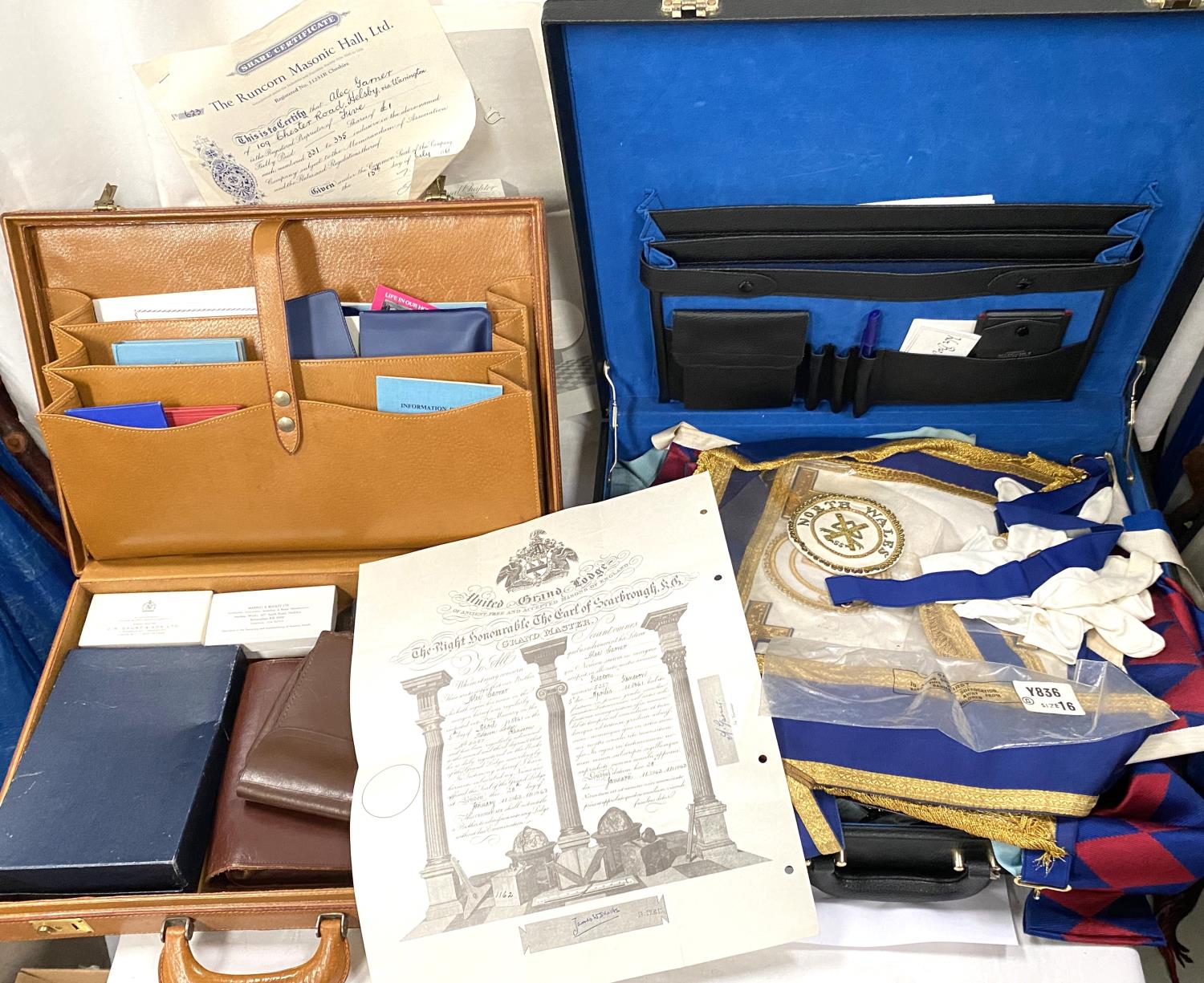 Two suitcases of Masonic aprons, regalia, jewels etc, some silver examples