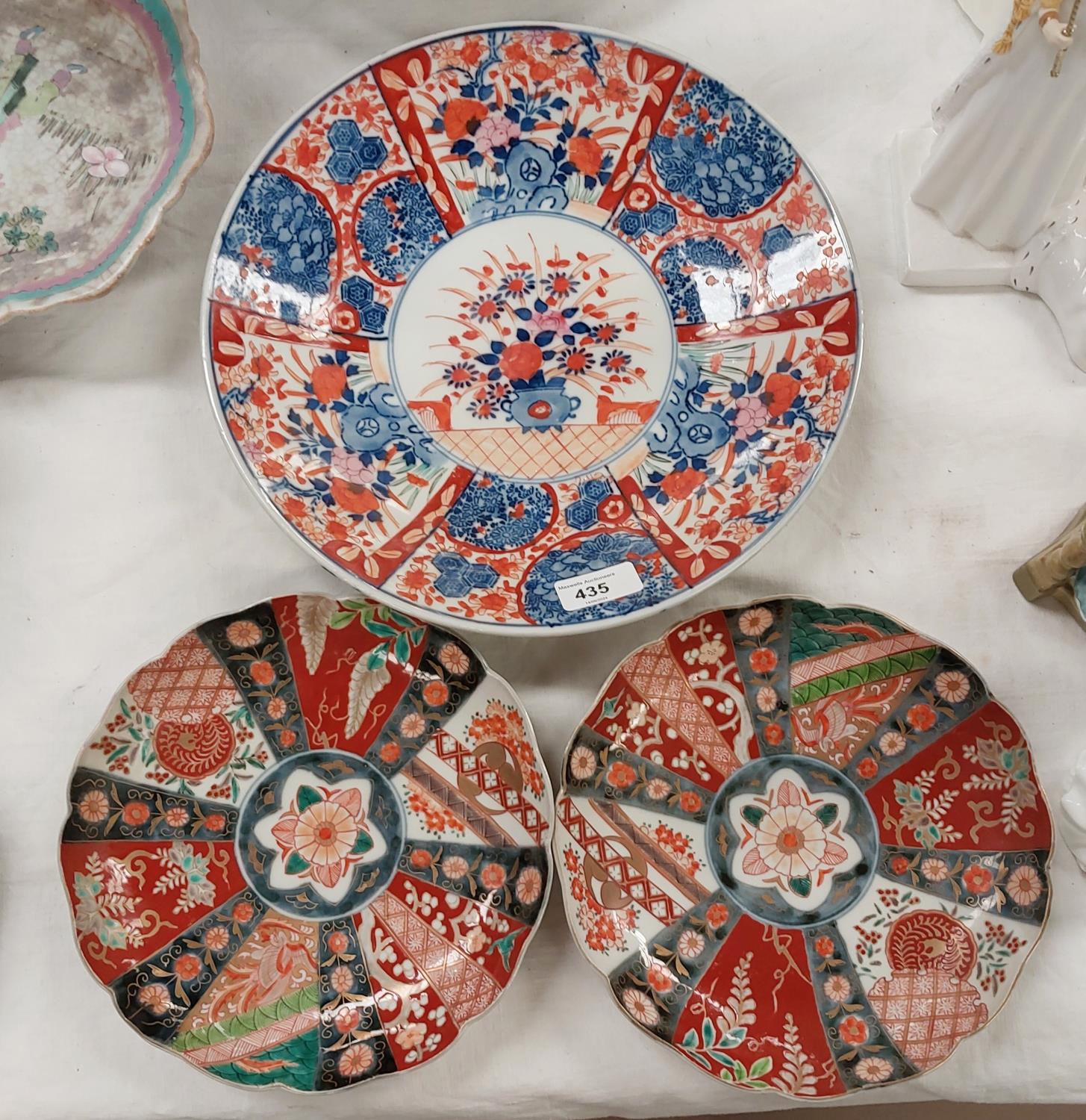 A late 19th/early 20th century Imari wall plaque, dia. 30cm; 2 small Imari wall plaques 21cm