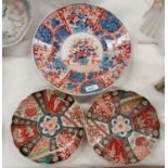 A late 19th/early 20th century Imari wall plaque, dia. 30cm; 2 small Imari wall plaques 21cm