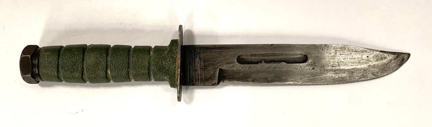 A Post WWII period Ka-bar type knife with military green composition handle, length 29cm