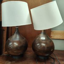 A pair of gourd shaped stained wood table lamps