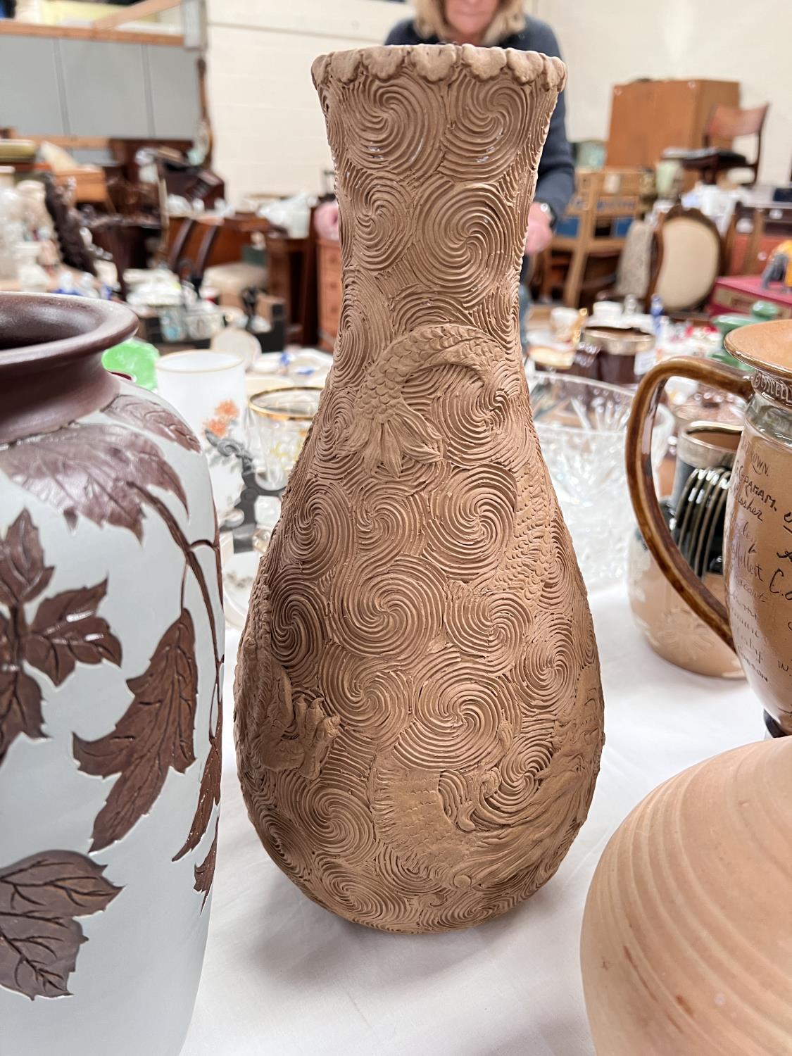 A pair of late 19th/early 20th century tapering stoneware vases with cut back and applied decoration - Image 3 of 7