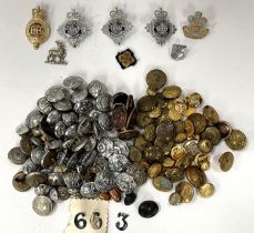 A good selection of military and Police badges a and buttons etc