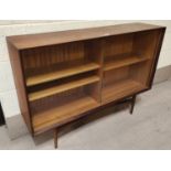 A 1960's G-Plan style teak side cabinet by Dalescraft enclosed by 2 sliding doors
