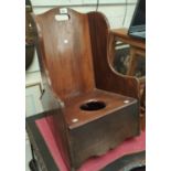 A 19th century mahogany childs rocking commode chair