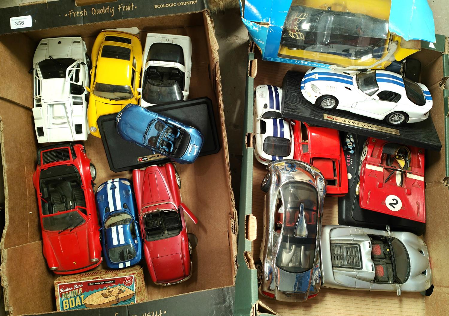 A collection of 1/18 scale car models by Maisto and others