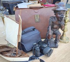 A Fujifilm digital SLR camera and collectables