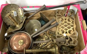 A selection of brassware including candlesticks, horse brasses, saucepans etc