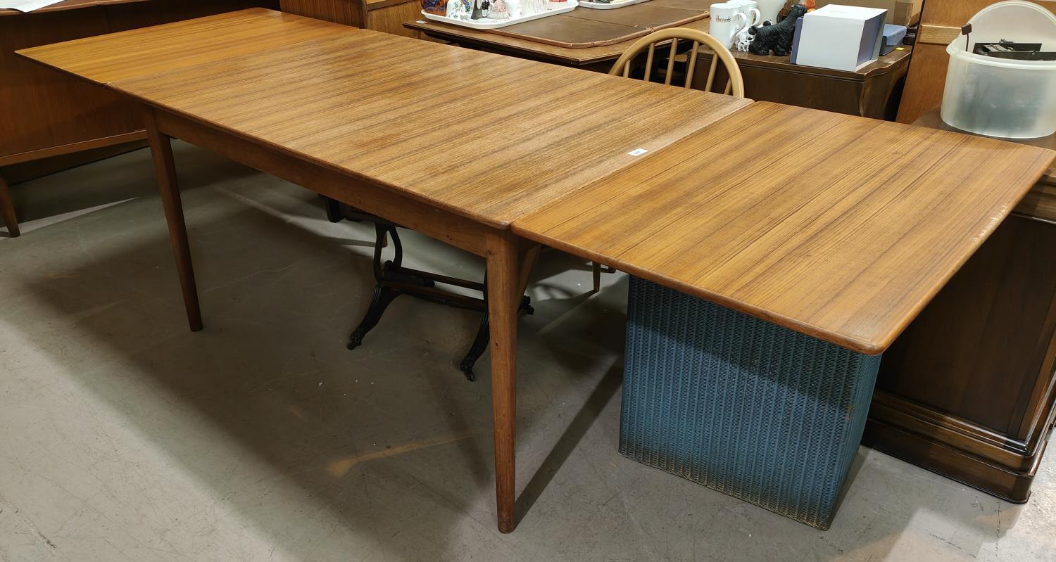 A G-Plan style 1960's rectangular teak draw-leaf dining table
