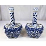 A pair of 19th century Chinese tulip or crocus vases blue and white decoration, with tapering neck