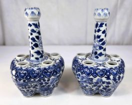 A pair of 19th century Chinese tulip or crocus vases blue and white decoration, with tapering neck