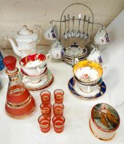 A continental 6 setting coffee set on vertical stand; a Harlequin set of Paragon teaware (6 cups and