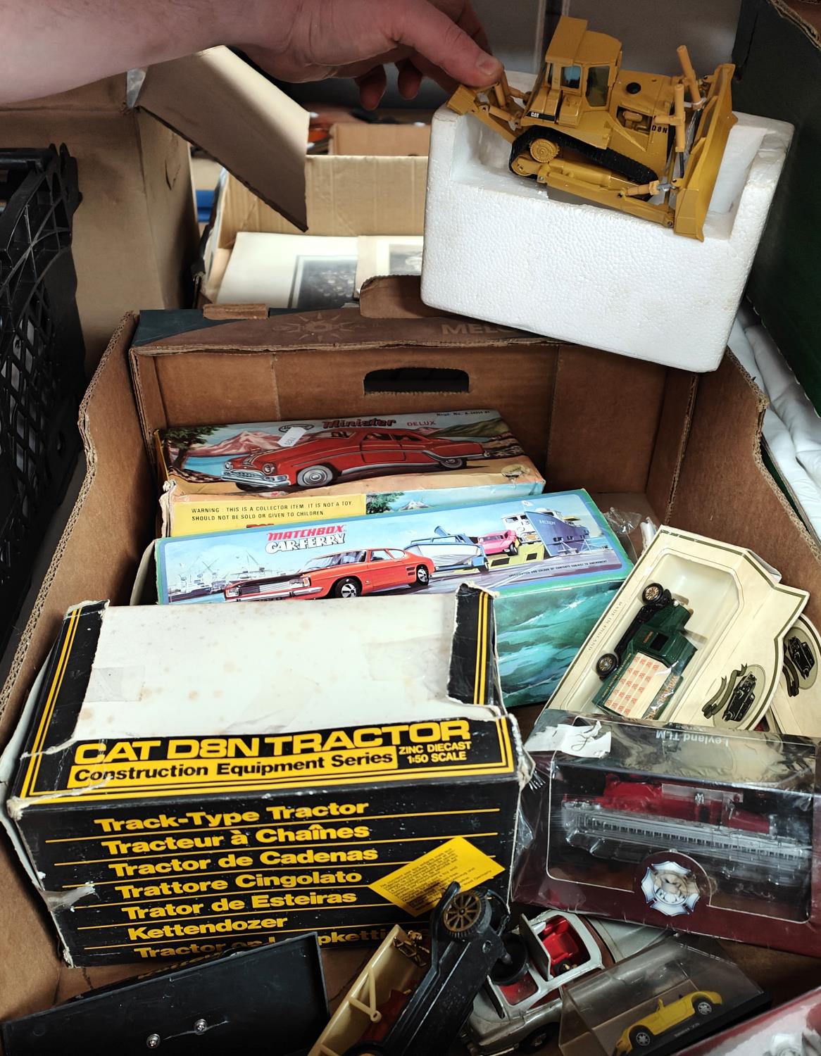 A collection of boxed and loose die-cast vehicles, various models etc. including CAT D8N Tractor,