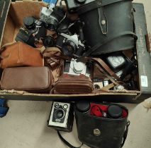 A collection of various vintage Agfa, Zenit cameras and binoculars