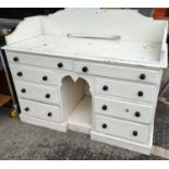 A Victorian pine painted side cabinet with 8 drawers below, length 123cm