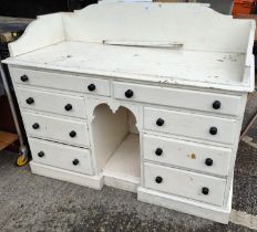 A Victorian pine painted side cabinet with 8 drawers below, length 123cm