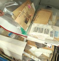 A large collection of British stamps in albums and loose