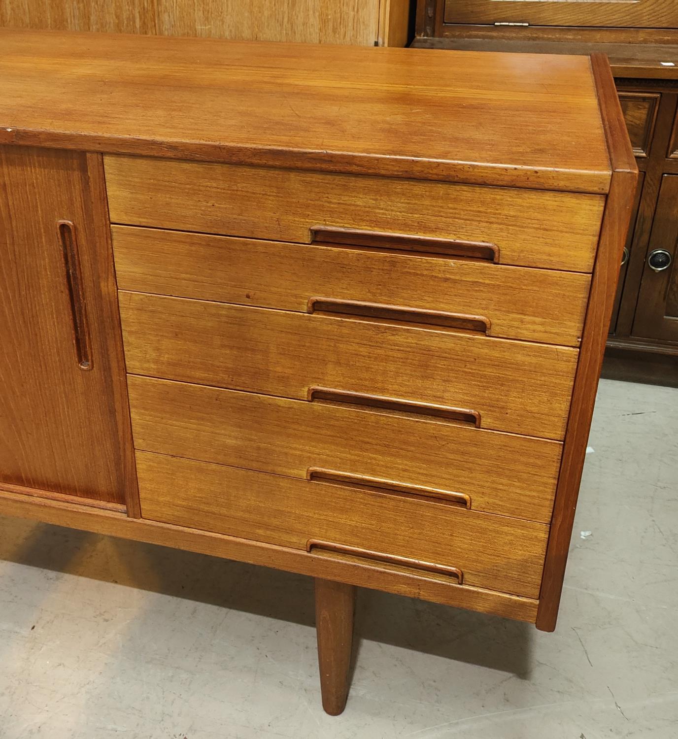 A 1960's G-Plan style teak sideboard with 2 sliding doors and 4 drawers - Image 3 of 4