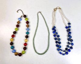 A MURANO, tutti frutti bead necklace, a lapis lazuli and river pearl double strand necklace , a