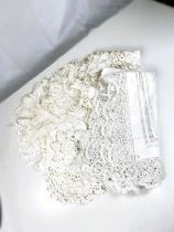 A selection of lace and drawn thread tray and table clothes etc