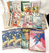 A selection of books and comics including war books and vintage 'Victor' comics etc