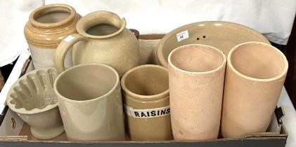 A selection of kitchen stoneware including storage jars, jelly mould, colander etc