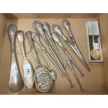 A silver sardine server and white metal handled items etc