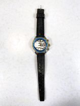 A vintage Aseikon gents wristwatch with rotating inner blue bezel on Tropical strap