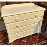 A modern 4 height chest of drawers in white finish
