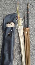 Two fishing rods and poles in vintage case, a box of tackle etc