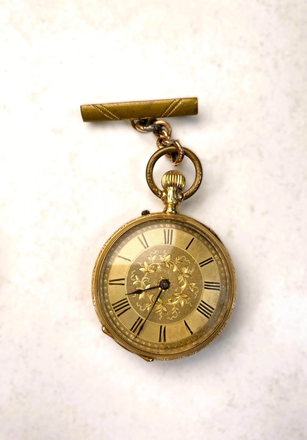 A chased yellow metal open faced keyless fob watch, the outer back case stamped 14K (a.f); a similar - Image 3 of 5