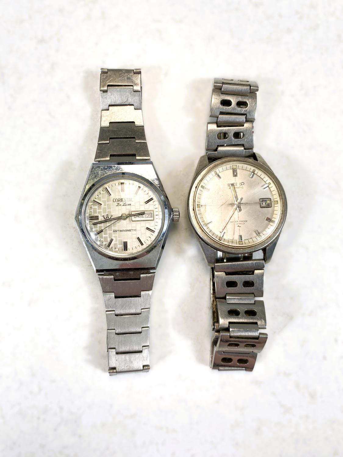 A vintage Seiko stainless steel automatic wrist watch and a similar watch