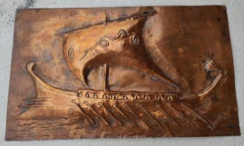 A Newlyn copper plaque depicting Viking ship signed bottom right